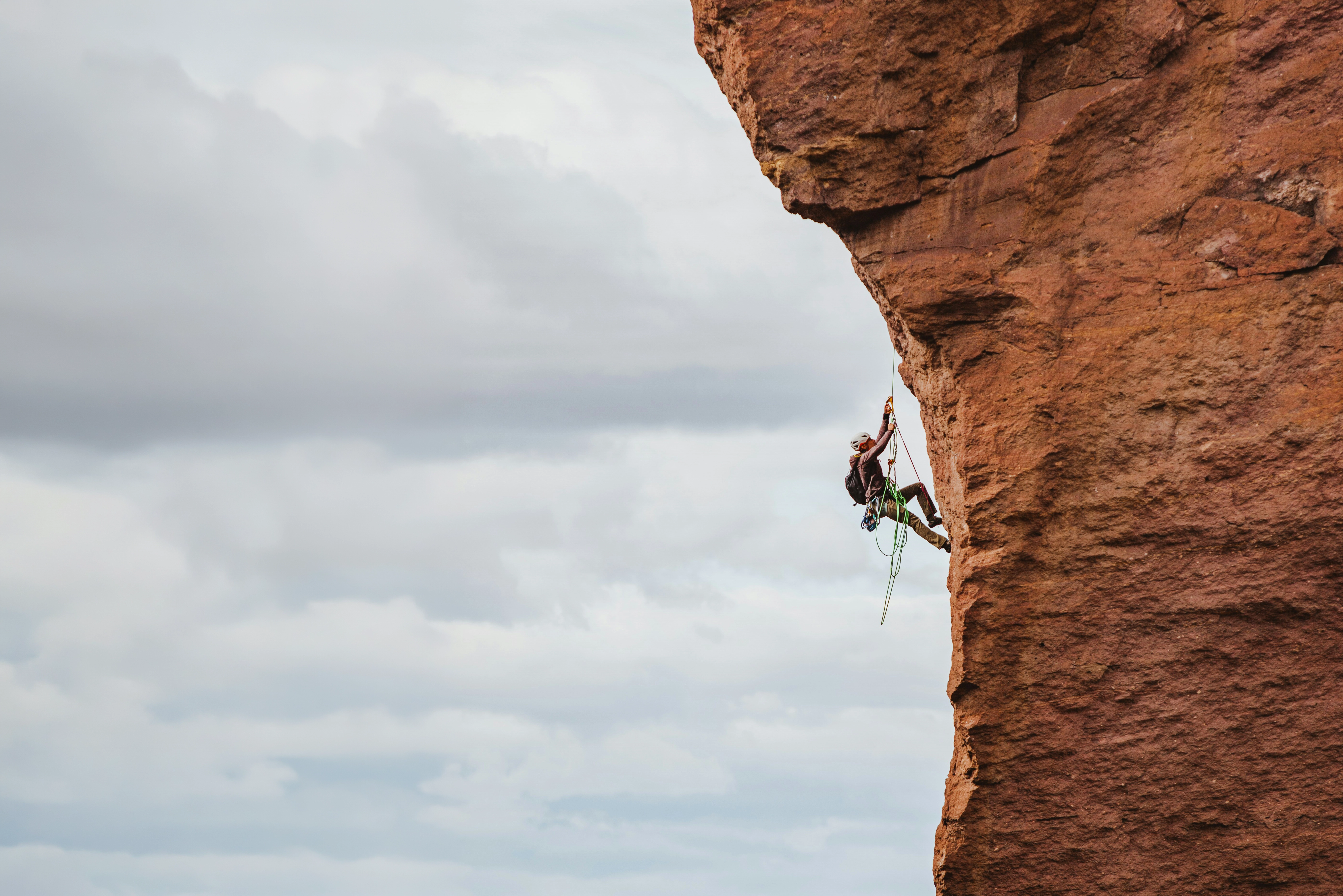 Men climbing mountian.