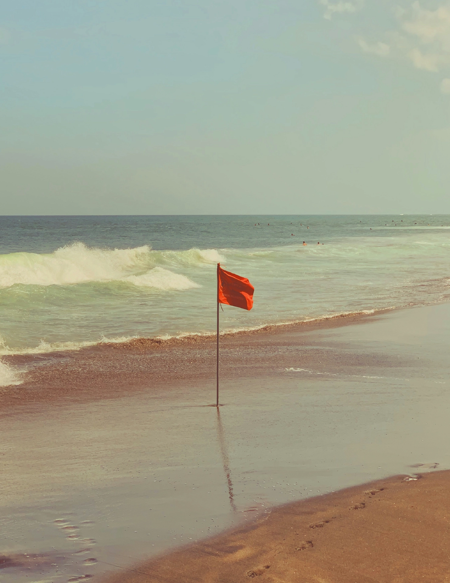 Red flag by the sea, symbolizing the prominent funds